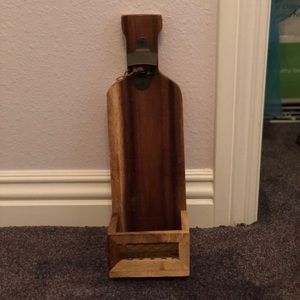 Beer bottle opener with cap catcher